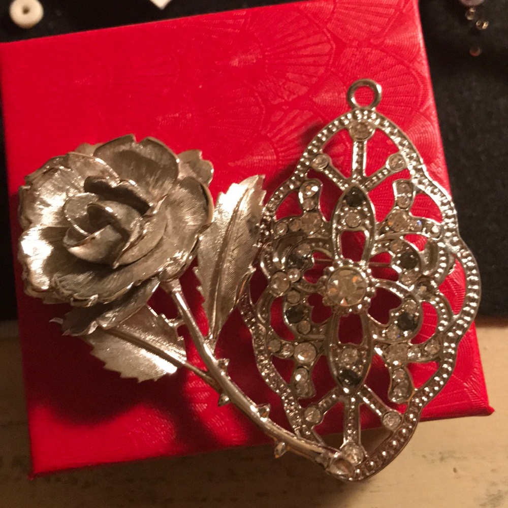 2 silver pins one is a pendant too